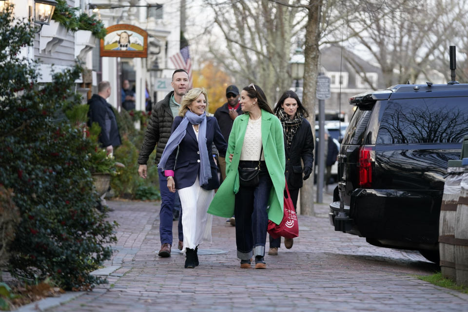 First lady Jill Biden walks with her daughter Ashley Biden as they visit shops in Nantucket, Mass., Friday, Nov. 24, 2023. (AP Photo/Stephanie Scarbrough)