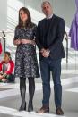 <p>Wearing a black-and-white printed long-sleeved dress, with silver jewelry, black tights, and heels while at the Fire Station Arts Centre in Sunderland with Prince William.</p>