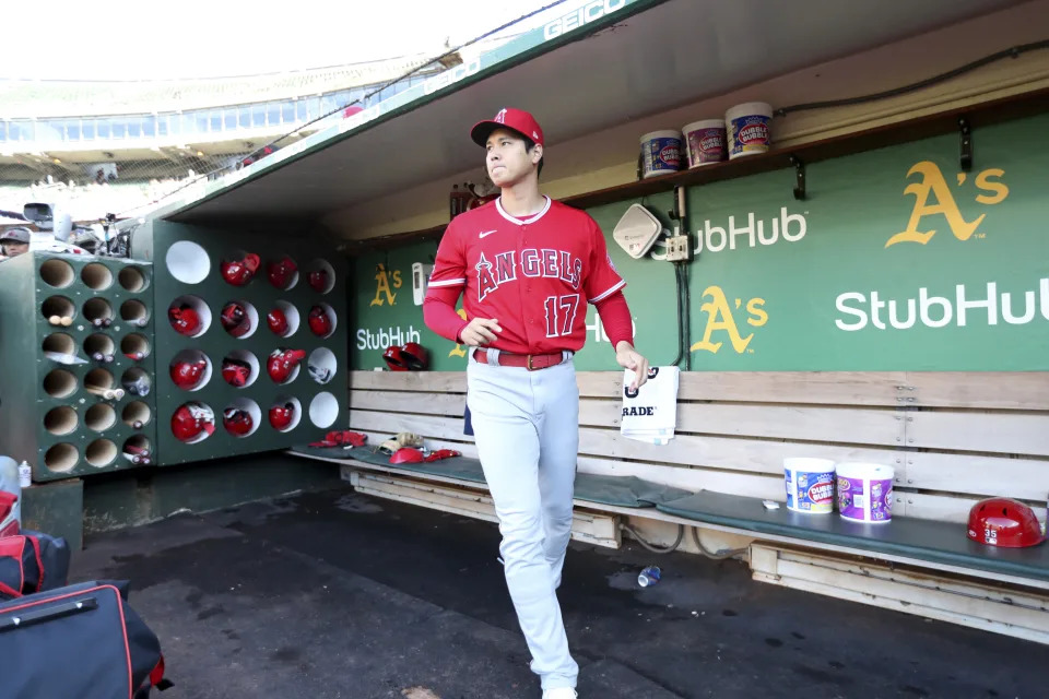 Los Angeles Angels&#39; Shohei Othani stands in the dugout before his baseball game against the Oakland Athletics in Oakland, Calif., Friday, May 13, 2022. (AP Photo/Jed Jacobsohn)