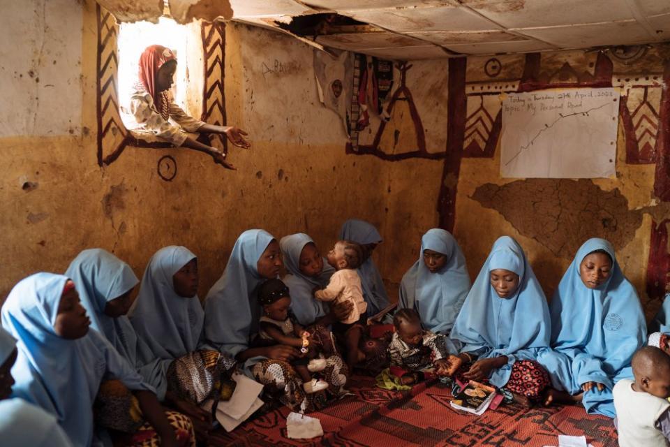 A program for adolescent mothers run by the Center for Girls Education in Zaria, Nigeria, which is expected by 2050 to overtake the United States as the world's third most populous country, on April 27. Educating girls has an unusually large impact on family size in Africa, because it delays the age of marriage and helps young women to space out their children, researchers have found.<span class="copyright">Hannah Reyes Morales—The New York Times/Redux</span>