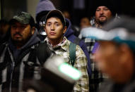 <p>Farmworkers and others cross in the pre-dawn hours from Mexicali, Mexico, through the Calexico Port of Entry in Calexico, Calif., March 6, 2018. (Photo: Gregory Bull/AP) </p>