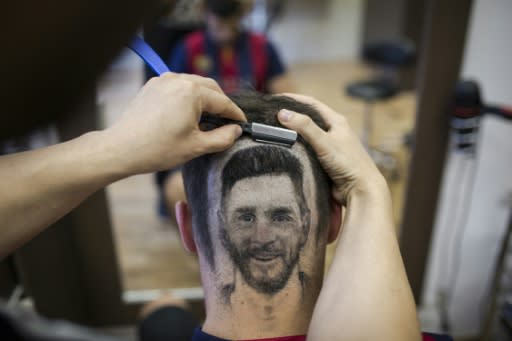 Serbian hairdresser Mario Hvala creates a hair 'tattoo' of Argentinian star Lionel Messi, on June 10 ahead of the World Cup in Russia