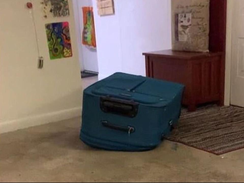 The suitcase was seen facedown in the footage (Orange-Osceola State Attorney’s Office)