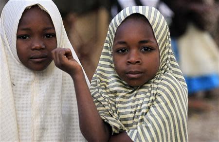 Two Fulani girls look on in Barkin Kogi, Zango Kataf, Kaduna State, March 22, 2014. REUTERS/Afolabi Sotunde