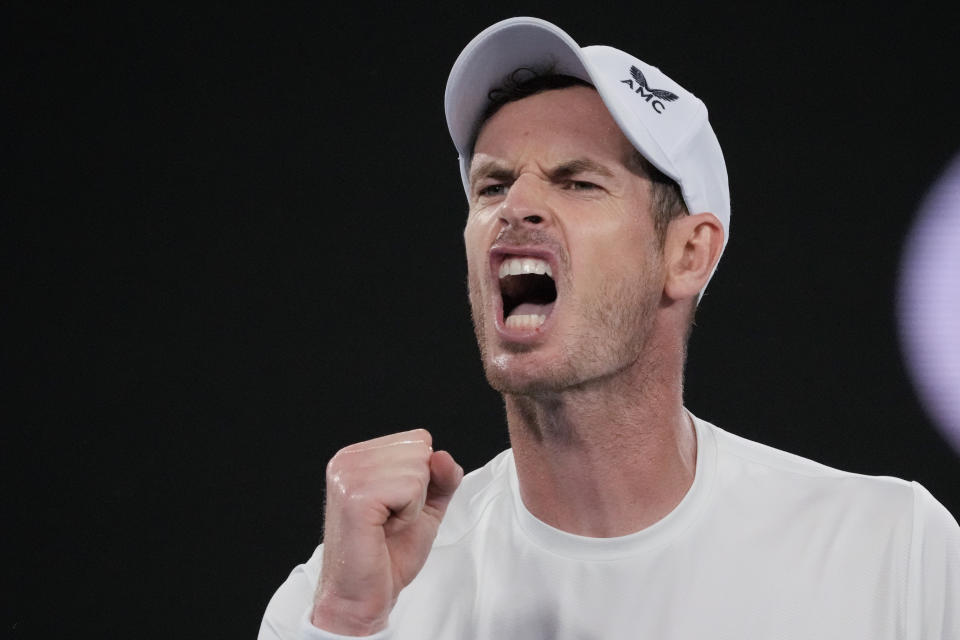 Andy Murray of Britain reacts during his first round match against Matteo Berrettini of Italy at the Australian Open tennis championship in Melbourne, Australia, Tuesday, Jan. 17, 2023. (AP Photo/Aaron Favila)