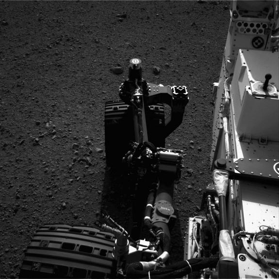 This still from a set of images shows the movement of the front left wheel of NASA's Curiosity as rover drivers turned the wheels in place at the landing site on Mars. Engineers wiggled the wheels as a test of the rover's steering and anticipat