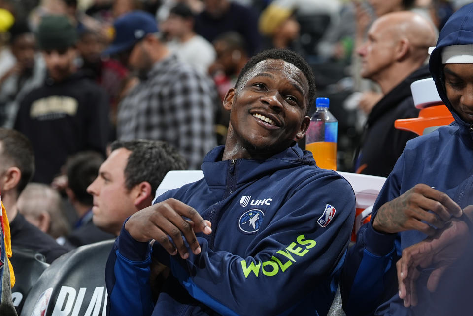 Minnesota Timberwolves guard Anthony Edwards sits in the bench after he was pulled from the floor late in the second half of Game 2 of an NBA basketball second-round playoff series against the Denver Nuggets Monday, May 6, 2024, in Denver. (AP Photo/David Zalubowski)