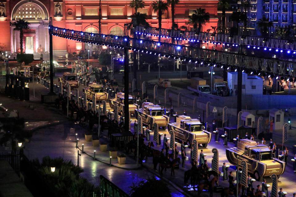 The carriages carrying 22 ancient Egyptian royal mummies depart from the Egyptian Museum in Cairo's Tahrir Square on April 3, 2021, during a parade on their way to their new resting place at the new National Museum of Egyptian Civilisation (NMEC) about seven kilometres south in historic Fustat (Old Cairo). - Dubbed the Pharaohs' Golden Parade, the 18 kings and four queens will travel in order, oldest first, each aboard a separate float decorated in ancient Egyptian style. (Photo by Khaled DESOUKI / AFP) (Photo by KHALED DESOUKI/AFP via Getty Images)