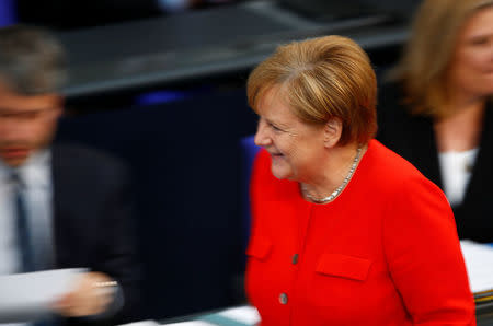 German Chancellor Angela Merkel leaves after a session at the lower house of parliament Bundestag in Berlin, Germany June 6, 2018. REUTERS/Axel Schmidt