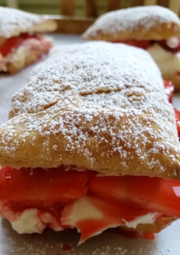 <p><a href="https://mooreorlesscooking.com/strawberry-cheesecake-puffs-video-sundaysupper/" rel="nofollow noopener" target="_blank" data-ylk="slk:Moore or Less Cooking;elm:context_link;itc:0;sec:content-canvas" class="link ">Moore or Less Cooking</a></p>