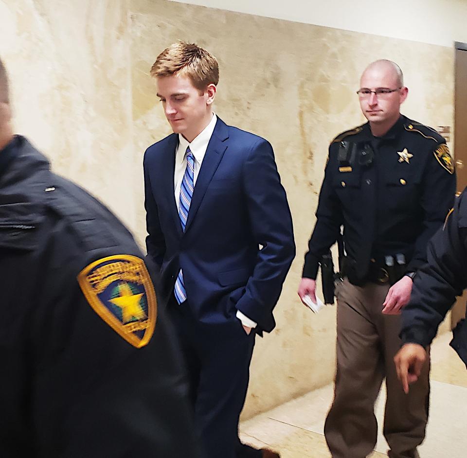 Hollis Daniels is escorted out of a Lubbock Courtroom on Monday after a jury was selected for his capital murder trial set to begin on Feb. 6.