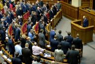 A group of Ukrainian lawmakers had earlier Monday disrupted the parliament to block the vote on the constitutional reforms, which they condemned as "anti-Ukrainian" and "pro-Vladimir Putin