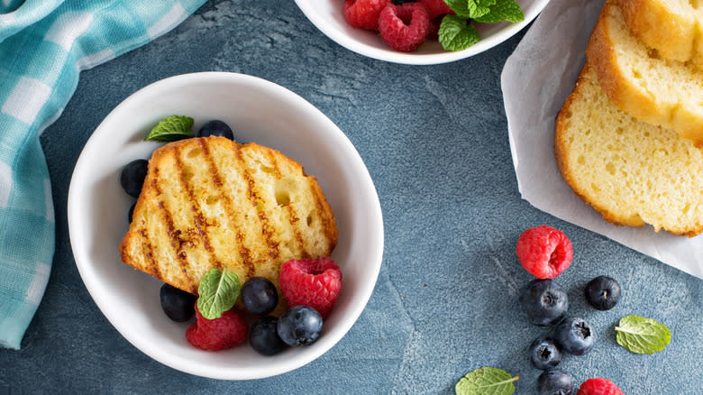 Top down bowl of grill pound cake with berries