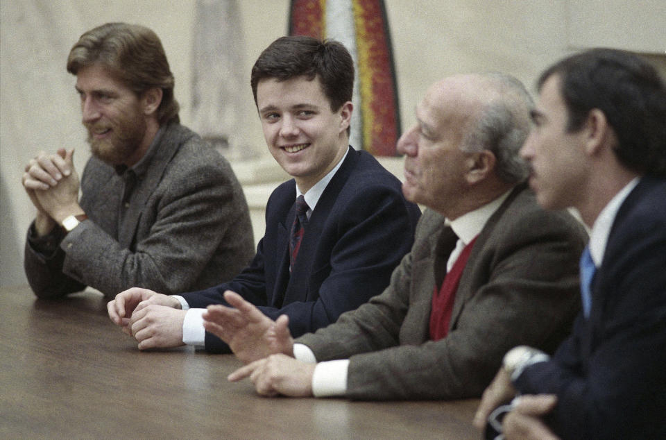 FILE - Danish Crown Prince Frederik, second from left, meets with the Mondavi family in Oakville on Friday, Jan. 20, 1989. As a teenager, Crown Prince Frederik felt uncomfortable being in the spotlight, and pondered whether there was any way he could avoid becoming king. All doubts have been swept aside as the 55-year-old takes over the crown on Sunday, Jan. 14, 2024 from his mother, Queen Margrethe II, who is breaking with centuries of Danish royal tradition and retiring after a 52-year reign. (AP Photo/David Weintraub, File)