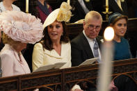 <p>After quickly ushering her children into the church, Kate Middleton showed off her uncontroversial choice of a white outfit. Photo: Getty </p>