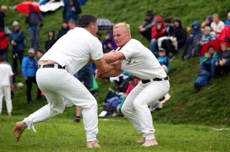 Men fight during the "Hundstoa Ranggeln" at Hundstein mountain near the village of Maria Alm