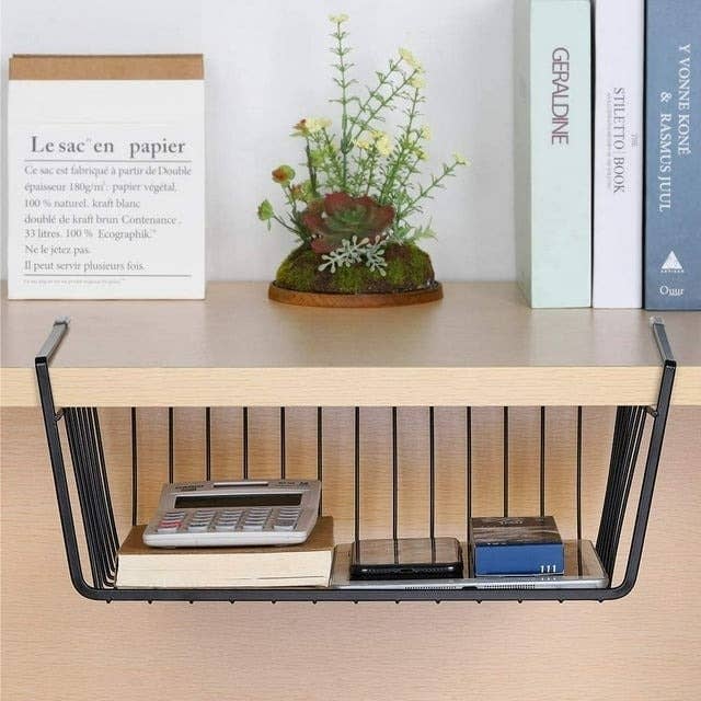 black under-shelf wire organizer with calculator and desk supplies