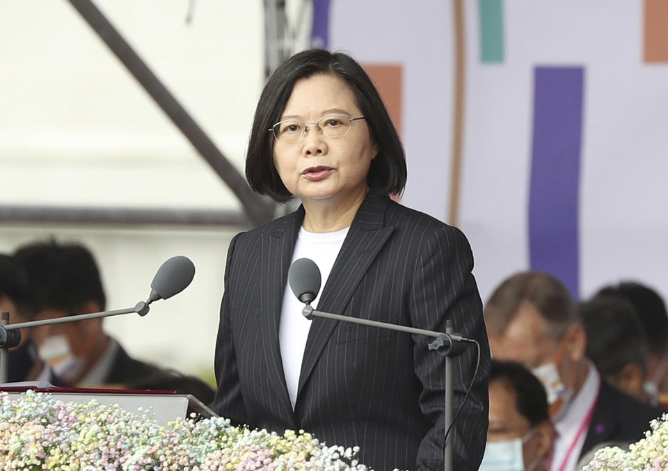 Taiwanese President Tsai Ing-wen delivers a speech during National Day celebrations in front of the Presidential Building in Taipei, Taiwan, Saturday, Oct. 10, 2020. Tsai said Saturday she has hopes for less tensions with China and in the region if Beijing will listen to Taipei’s concerns, alter its approach and restart dialogue with the self-ruled island democracy. (AP Photo/Chiang Ying-ying)