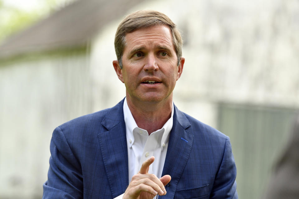 Kentucky Gov. Andy Beshear sits for an interview in Versailles, Ky., Wednesday, May 17, 2023. Beshear won the Democratic primary for governor, and will face Republican Kentucky Attorney General Daniel Cameron in the general election in Nov. (AP Photo/Timothy D. Easley)