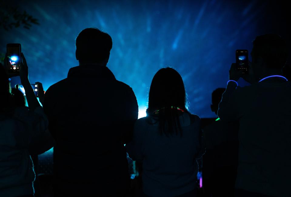 Nighttime is the right time for "Unextinct," an entertaining, educational experience at the Columbus Zoo and Aquarium where guests can journey through a world inhabited by extinct and endangered species.