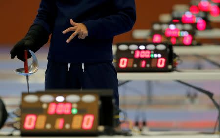 2016 Rio Olympics - Fencing - Women's Training - Riocentro - Rio De Janeiro, Brazil - 27/07/2016. An athlete gestures during practice. REUTERS/Damir Sagolj