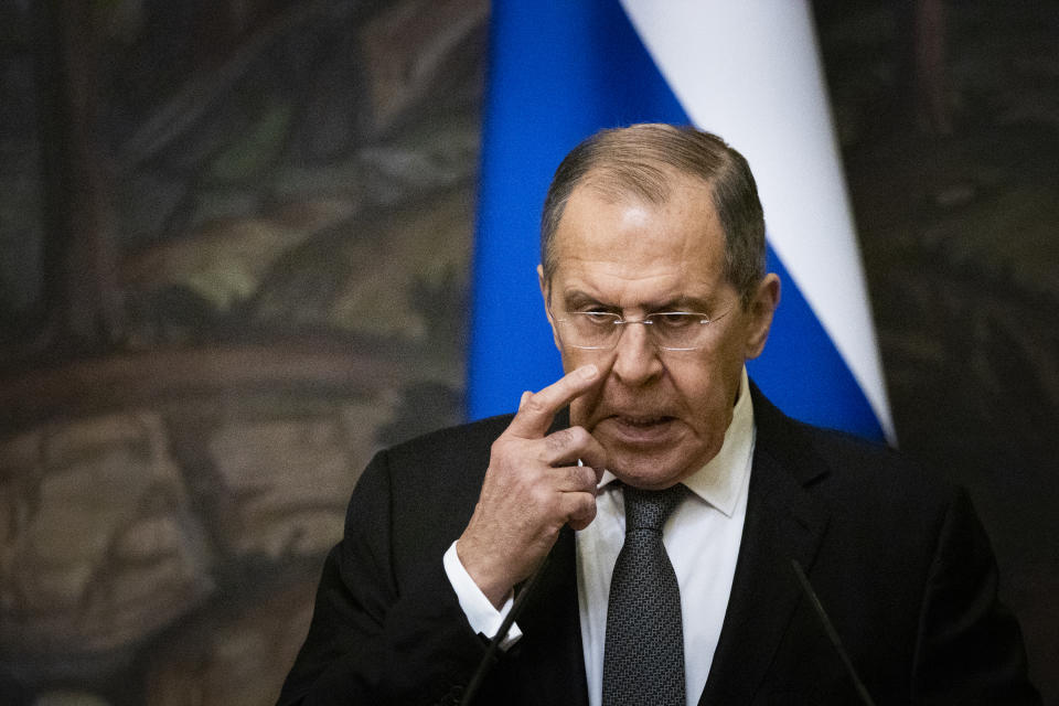 FILE - In this Wednesday, May 5, 2021 file photo, Russian Foreign Minister Sergey Lavrov gestures during a joint news conference with Palestinian Foreign Minister Riyad Al-Maliki following their talks in Moscow, Russia. The U.S. Embassy in Moscow sharply limited consular services starting Wednesday, May 12 following a Russian ban on hiring local staff, leaving many U.S. citizens and Russian visa seekers in limbo. "We warned them a long time ago that we, as well, will transfer our own practice on to the relations between countries in the sphere of operations of diplomatic missions," said Russian Foreign Minister Sergei Lavrov late last month about the new restrictions for the U.S. embassy. (AP Photo/Alexander Zemlianichenko, Pool, File)