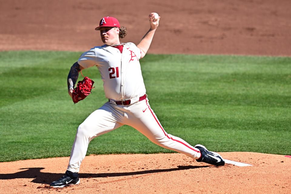 Mason Molina throws a pitch during the Arkansas baseball game against Murray State on Sunday, March 3, 2024.