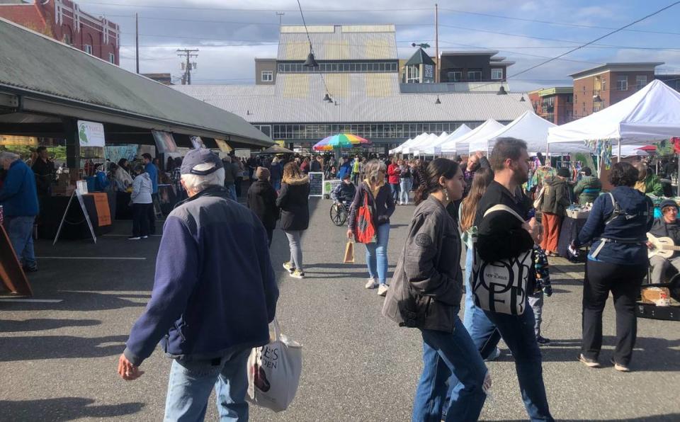Shoppers check out the vendors at the Bellingham Farmers Market on opening day Saturday, April 2, 2022, at Depot Market Square, 1100 Railroad Ave. in Bellingham, Wash. File/The Bellingham Herald