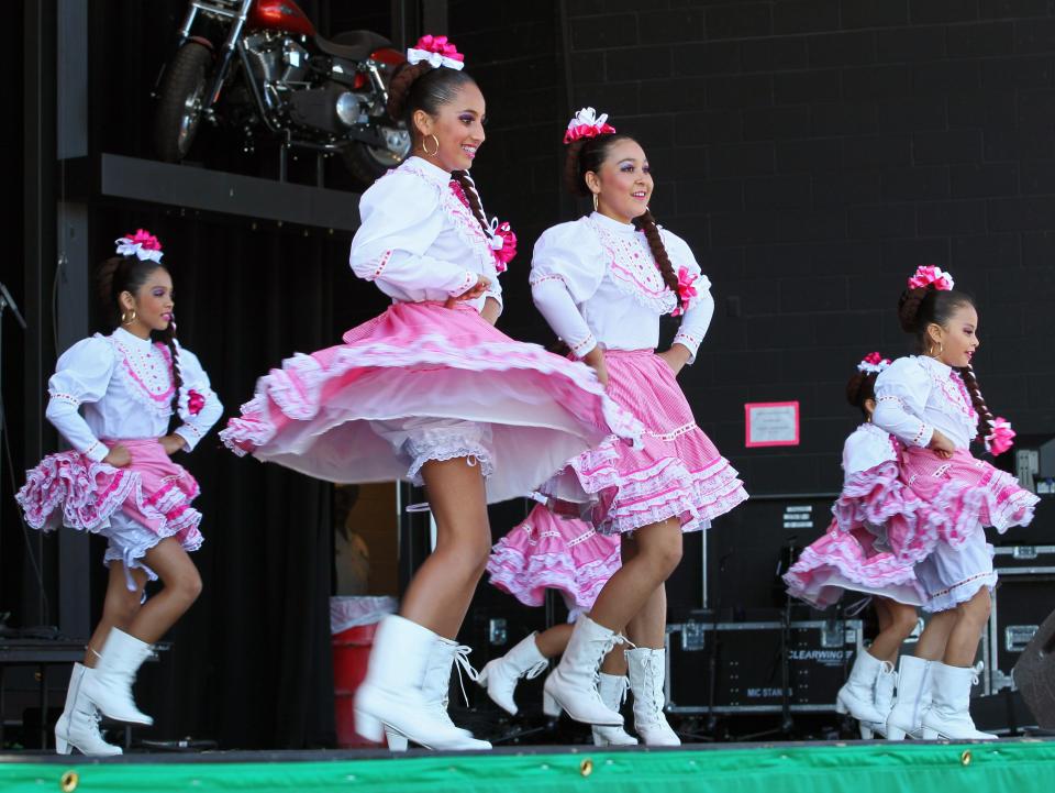 Members of Ballet Folklorico Nuestro Mexico dance for the crowd during Mexican Fiesta in 2013.