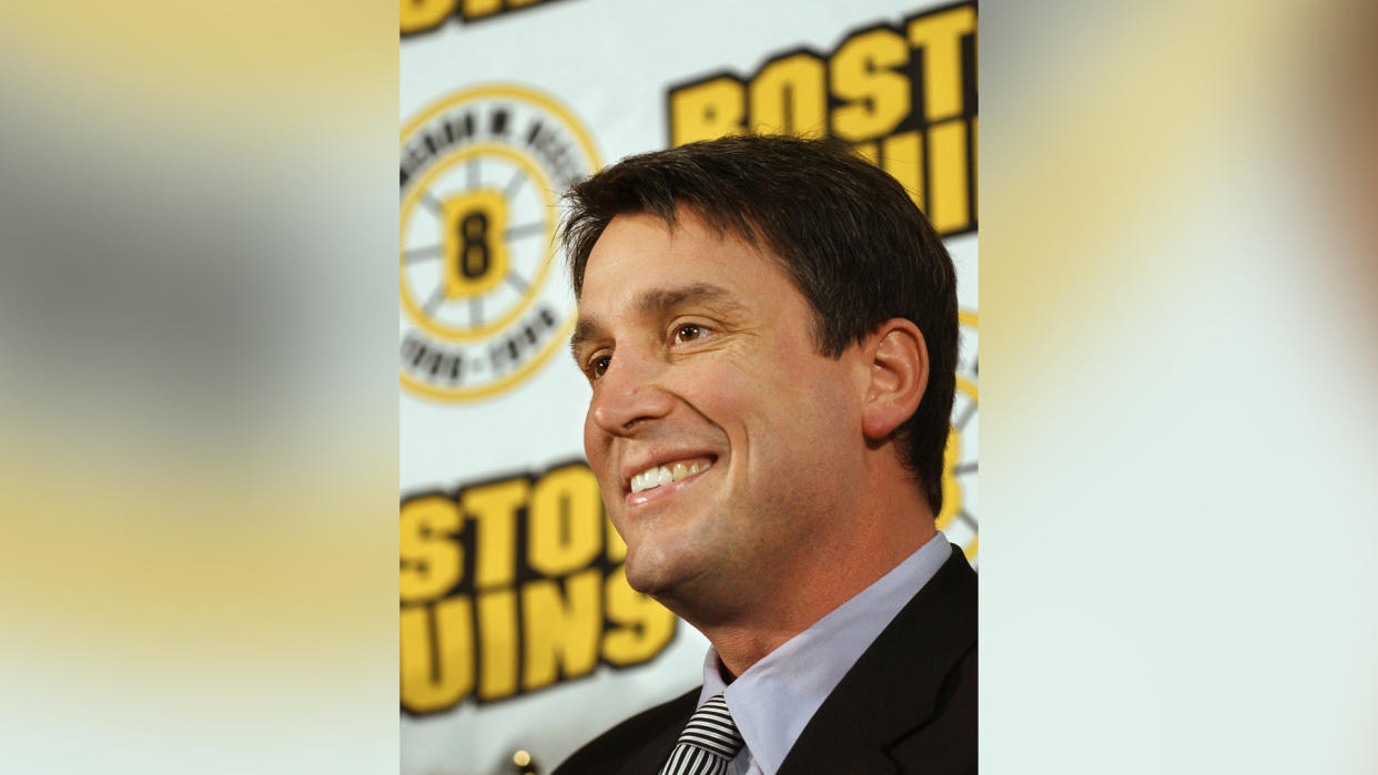 Mandatory Credit: Photo by Steven Senne/AP/Shutterstock (5968529a)Cam Neely In this, file phto, Boston Burins great Cam Neely smiles while facing reporters in Boston.