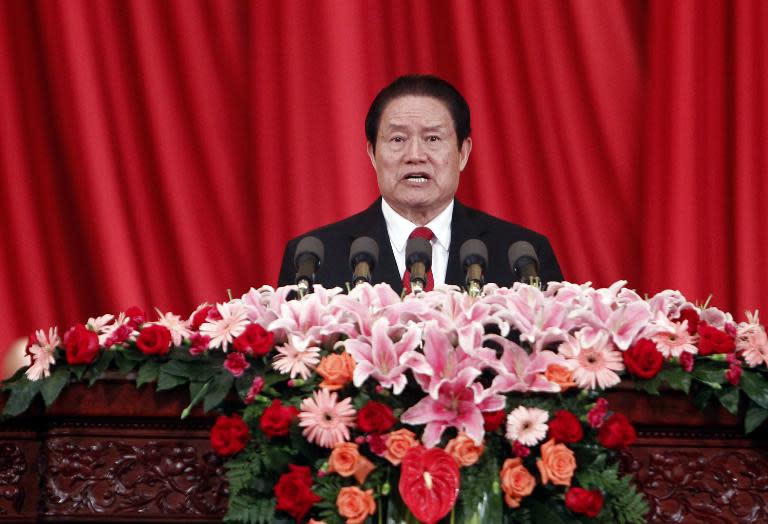 Zhou Yongkang, pictured giving a speech in Beijing on May 18, 2012, has been expelled from the Communist Party and arrested, the state-run Xinhua news agency reports