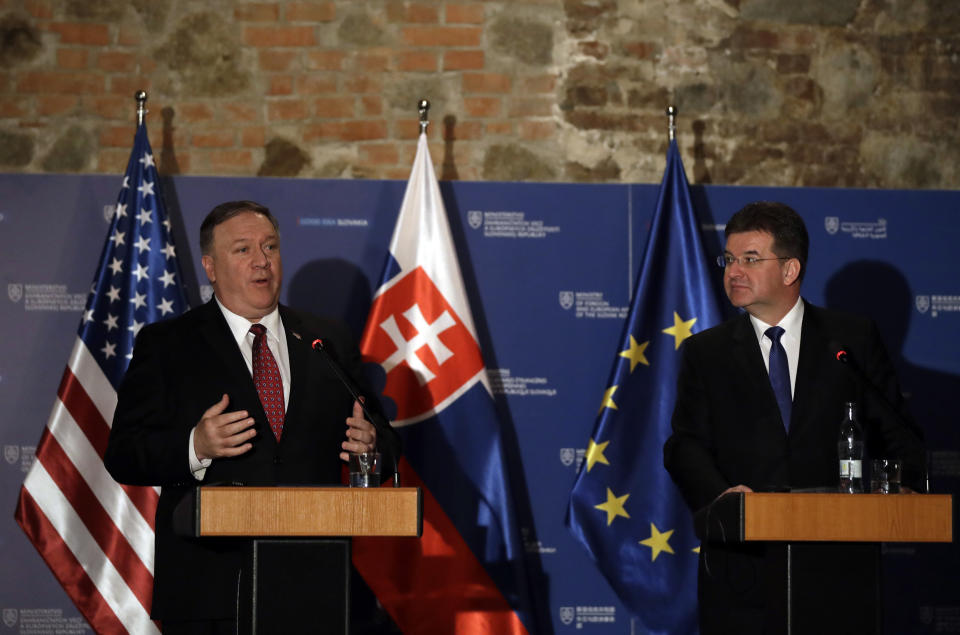 Slovakia Foreign Affairs Minister Miroslav Lajcak, right, and US Secretary of State Mike Pompeo address the media during a press conference in Bratislava, Slovakia, Tuesday, Feb. 12, 2019. Pompeo is in Slovakia on the second leg of a five-nation European tour that began in Hungary and will take him to Poland, Belgium and Iceland. (AP Photo/Petr David Josek)