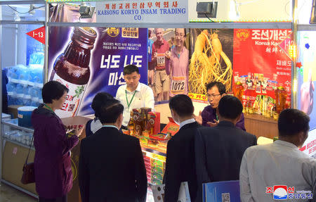 People attend the 22nd Pyongyang Spring International Trade Fair, in Pyongyang, North Korea May 20, 2019. KCNA via REUTERS