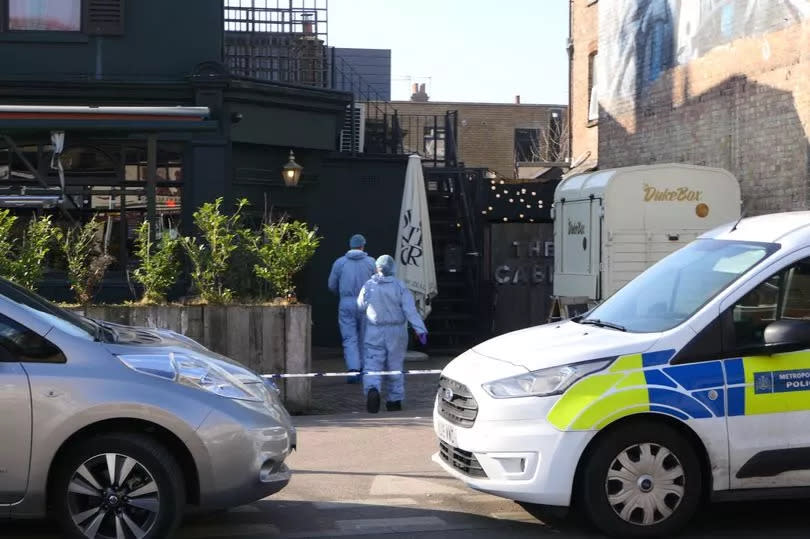 Forensic officers entering The Duke in Walthamstow