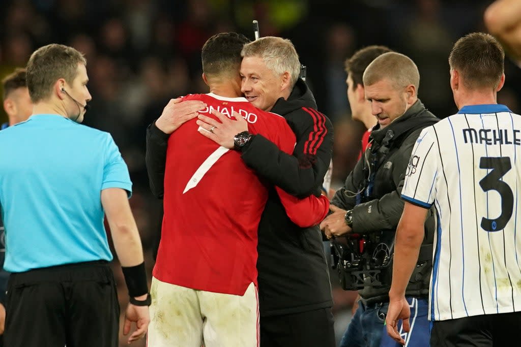 Ole Gunnar Solskjaer congratulates Cristiano Ronaldo on his late winner  (AP)