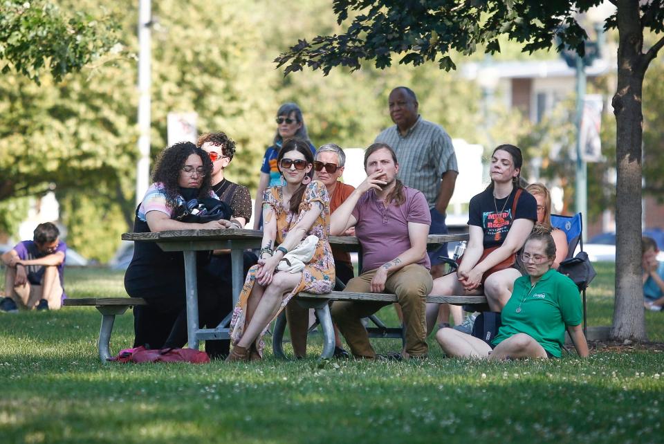 Community members gather during a celebration of life service on Tuesday, Aug. 2, 2022, for Tyler and Sarah Schmidt and their 6-year-old daughter, Lula, who were killed in a shooting in the Maquoketa Caves State Park.