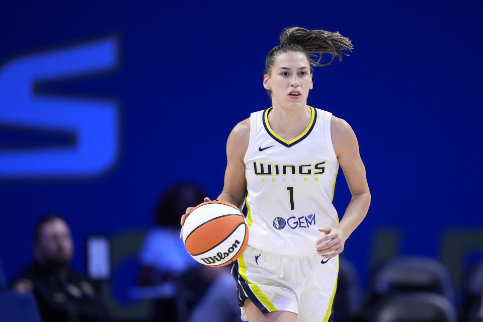 Dallas Wings' Sevgi Uzun (1) handles the ball during a WNBA basketball game against the Minnesota Lynx in Arlington, Texas, Thursday, June 27, 2024. (AP Photo/Tony Gutierrez)