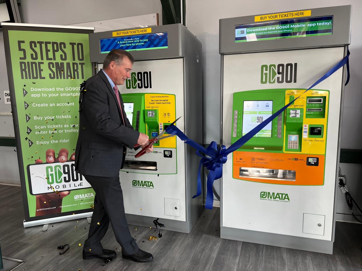 Memphis Area Transit Authority Chief Development Officer John Lancaster opens two kiosks at MATA's American Way station on Aug. 21, 2023. The kiosks are part of a new initiative to have riders sign up for smart cards. The GO901 app can also be used to add funds to the cards.