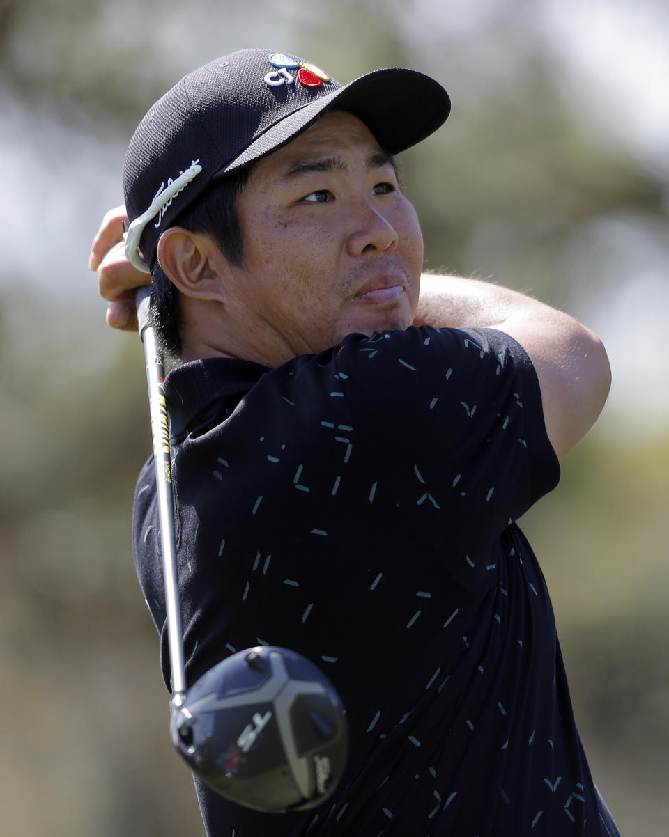Byeong-Hun An, of South Korea, tees off on the ninth hole during the first round of The Players Championship golf tournament Thursday, March 14, 2019, in Ponte Vedra Beach, Fla. (AP Photo/Gerald Herbert)