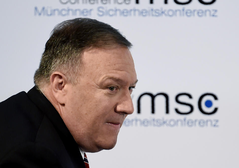 U.S. Secretary of State Mike Pompeo goes to the stage on the second day of the Munich Security Conference in Munich, Germany, Saturday, Feb. 15, 2020. (AP Photo/Jens Meyer)