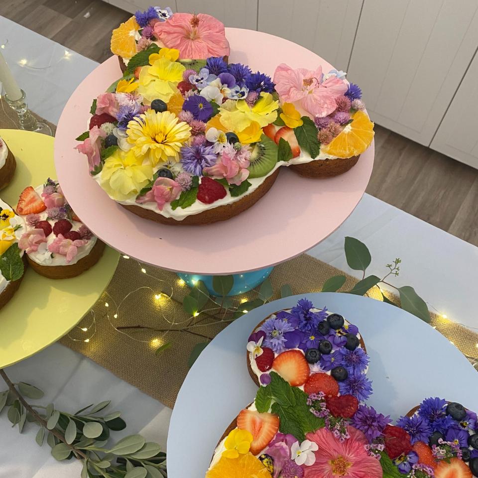 Flower-decorated Mickey Mouse-shaped cakes