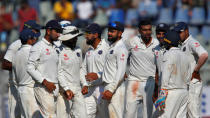 Cricket - India v England - Fourth Test cricket match - Wankhede Stadium, Mumbai, India - 8/12/16. India's players celebrate the wicket of England's Moeen Ali. REUTERS/Danish Siddiqui