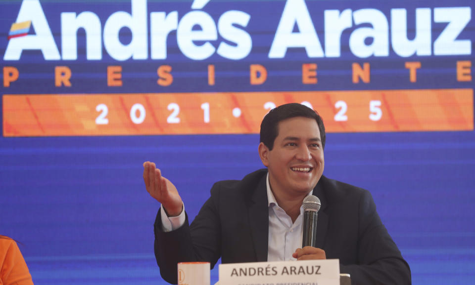 The top candidate in Sunday’s ballot Andres Arauz, presidential candidate for the United for Hope Alliance or UNES, speaks at a press conference in Quito, Ecuador, Tuesday, Feb. 9, 2021. Long after polls closed, it was not clear if Arauz would face Guillermo Lasso, in his third run for the presidency after a long career in business, banking and government, or Yaku Pérez, an Indigenous rights and environmental activist, in the April 11 runoff election. (AP Photo/Dolores Ochoa)