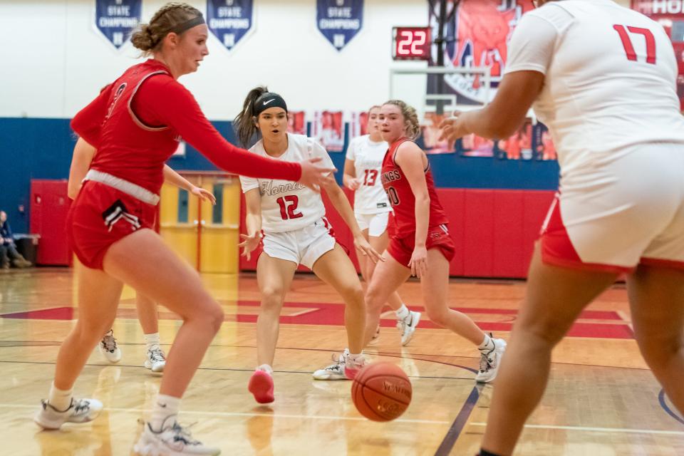 Hornell's Selena Maldonado drops a bounce pass through traffic in Friday's home win over visiting Dansville.