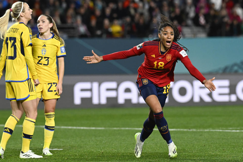 Spain's Salma Paralluelo, right, celebrates after scoring her team's first goal during the Women's World Cup semifinal soccer match between Sweden and Spain at Eden Park in Auckland, New Zealand, Tuesday, Aug. 15, 2023. (AP Photo/Andrew Cornaga)