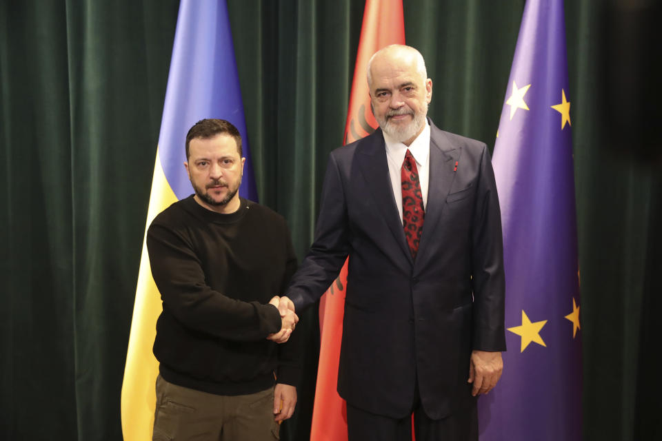 Albanian Prime Minister Edi Rama, right, welcomes Ukrainian President Volodymyr Zelenskyy before their meeting in Tirana, Albania, Wednesday, Feb. 28, 2024. Albania hosts on Thursday a summit of Southeastern European countries on peace, security and cooperation, focused on the war in Ukraine. (AP Photo/Armando Babani)