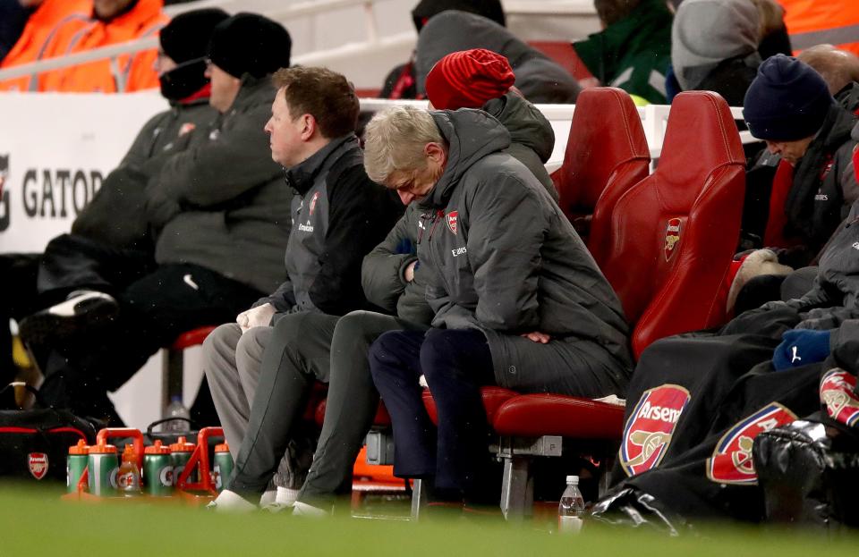 Arsene Wenger cut a dejected figure long before the half-time whistle