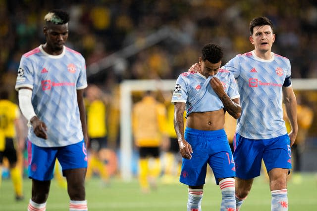 Paul Pogba, Jesse Lingard and Harry Maguire leave the field at full-time 