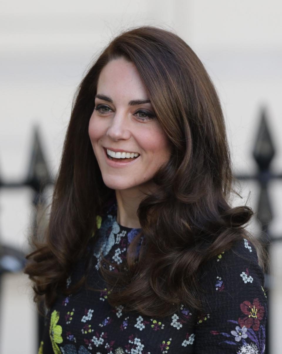 <p>It’s not just Kate’s wardrobe that everyone hankers to recreate: The royal’s bouncy, brunette locks have inspired thousands of haircuts around the world in the past five years. <em>[Photo: PA]</em> </p>