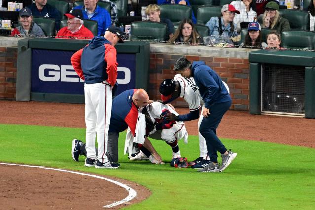 Reggie and Uno had a pawesome time leading the @Atlanta Braves on-fie